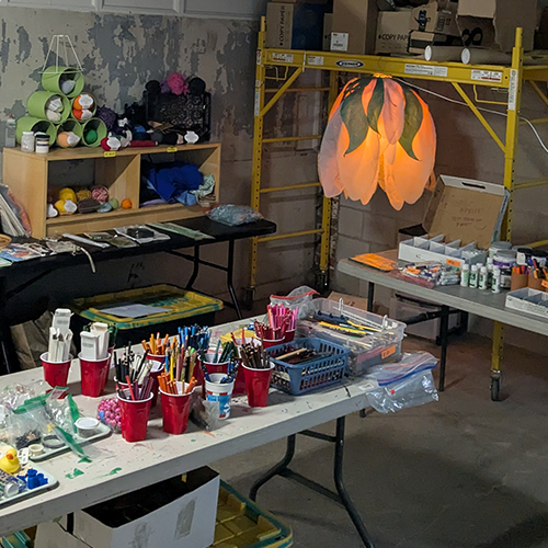 tables full of art supplies