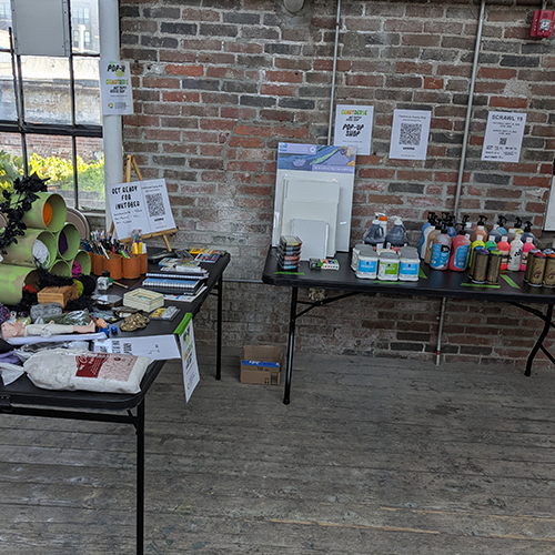 tables full of art supplies